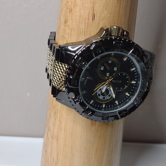 8 Inch Black And Gold Tone Large Analog Watch - Picture 2 of 14